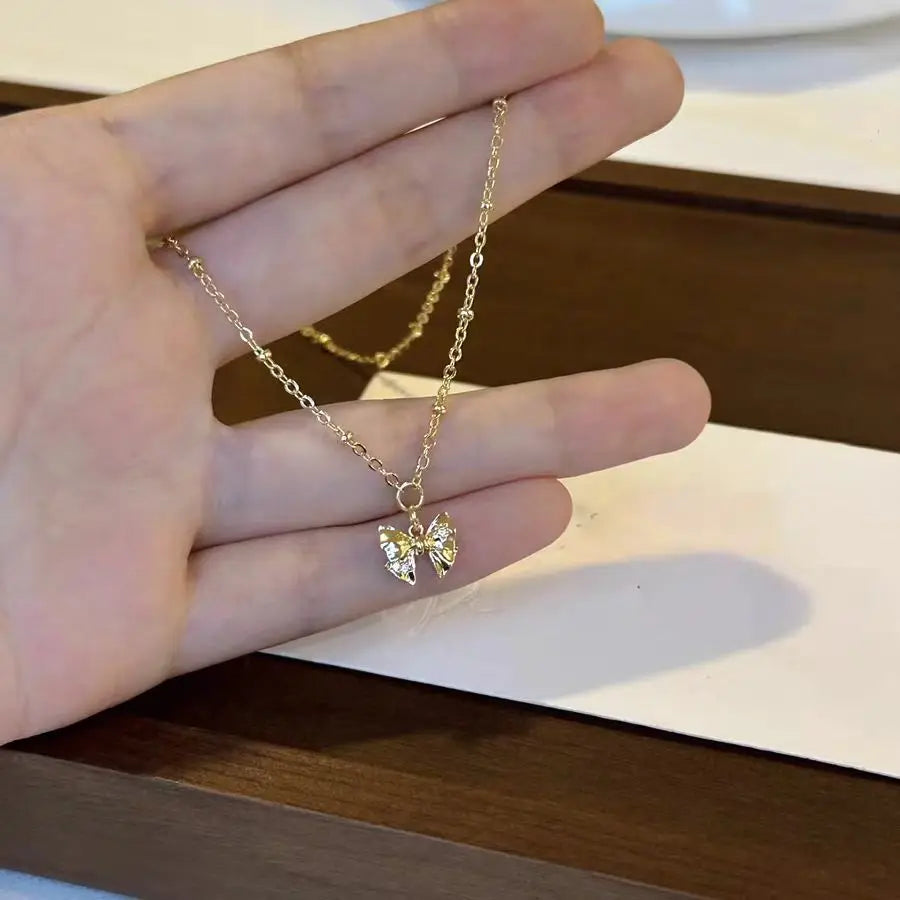 Sparkle Bow — Gold Necklace